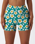 Cartoon fried eggs pattern pastel blue shorts