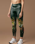 Colorful blooming wildflowers dark green leggings