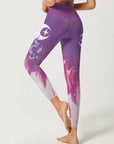 Cosmos celestial bodies moon snake design purple leggings