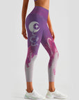 Cosmos celestial bodies moon snake design purple leggings