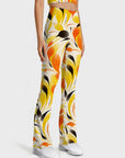 Abstract colorful teardrop shaped flare leggings