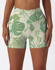 Botanical monstera leaves hand painted green shorts