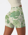 Botanical monstera leaves hand painted green shorts