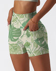 Botanical monstera leaves hand painted green shorts