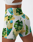 Botanical hawaiian monstera leaves surfboard shorts