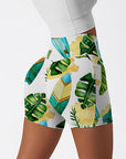 Botanical hawaiian monstera leaves surfboard shorts