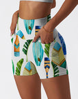 Botanical hawaiian palm leaves surfboard paddle shorts