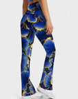 Botanical blue ginkgo leaf gold edge flare leggings