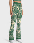 Botanical chinese style green flowers and birds flare leggings