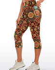 Ornate golden floral pattern red capris