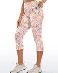 Botanical pink palm trees capris