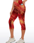 Shimmering gold glitter on red background capris