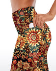 Ornate golden floral pattern red capris