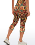 Ornate golden floral pattern red capris