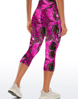 Tie dye pink and green psychedelic colored water ripple capris