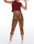 Ornate golden floral pattern red capris