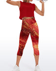 Shimmering gold glitter on red background capris