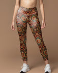 Ornate golden floral pattern red leggings