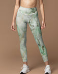 Gilt water ripple gold green marble print leggings