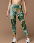 Abstract green watercolor gilt water ripples leggings