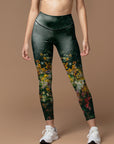 Colorful blooming wildflowers dark green leggings