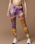 Water ripples with gold sunshine and purple captured leggings