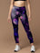 Purple planet with stars in the universe leggings