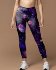 Purple planet with stars in the universe leggings