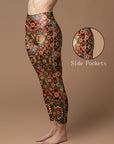 Ornate golden floral pattern red leggings