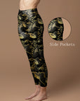 Deaturing gold umbrella outlined in gold leggings