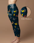 Colorful butterflies flying on animal skin leggings