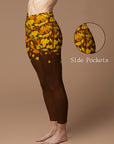 Botanical autumn falling maple leaves brown leggings