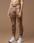 Ornate golden floral pattern red leggings