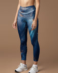 Gold shining through the sea surface water ripple leggings