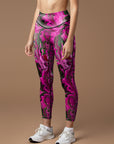 Tie dye pink and green psychedelic colored water ripple leggings