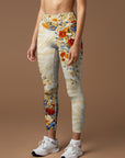 Vibrant wildflowers on creamy swirl leggings