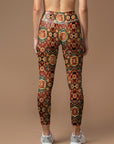 Ornate golden floral pattern red leggings