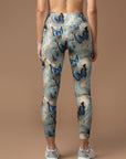 Butterfly floating in gilt water ripples leggings