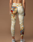 Vibrant wildflowers on creamy swirl leggings