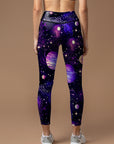 Purple planet with stars in the universe leggings