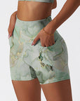 Gilt water ripple gold green marble print shorts