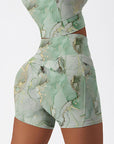 Gilt water ripple gold green marble print shorts