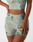 Gilt water ripple gold green marble print shorts